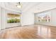 Bright living room showcasing hardwood floors and recessed lighting at 4324 Peaceful Path Ct, North Las Vegas, NV 89032