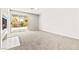 Spacious living room featuring a fireplace and sliding glass doors at 4324 Peaceful Path Ct, North Las Vegas, NV 89032