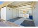 Interior of horse barn featuring stalls, rubber mats, and proper lighting at 4620 N Tee Pee Ln, Las Vegas, NV 89129