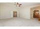 Large bedroom offering a ceiling fan and access to a private vanity area at 4620 N Tee Pee Ln, Las Vegas, NV 89129