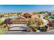 Charming two-story home with tile roof, lush landscaping, and gated entrance at 4620 N Tee Pee Ln, Las Vegas, NV 89129