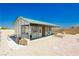 Well-maintained horse barn with individual stalls, ample space, and covered area at 4620 N Tee Pee Ln, Las Vegas, NV 89129