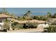 Neighborhood view with beautiful tree coverage and well-maintained landscaping at 4620 N Tee Pee Ln, Las Vegas, NV 89129