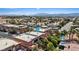 Expansive community featuring a mix of modern homes, lush landscaping, and resort-style amenities at 5603 Deer Creek Falls Ct, Las Vegas, NV 89118