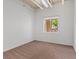 Bright bedroom with a window, neutral carpet and an industrial-style ceiling at 5603 Deer Creek Falls Ct, Las Vegas, NV 89118