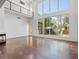 Living room with fireplace and large glass windows, lots of light at 5603 Deer Creek Falls Ct, Las Vegas, NV 89118
