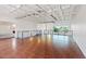 Open floor plan featuring exposed ceilings, hardwood floors and lots of natural light at 5603 Deer Creek Falls Ct, Las Vegas, NV 89118