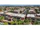 An aerial view of an upscale neighborhood showcasing modern homes, mature trees, and manicured landscaping at 5603 Deer Creek Falls Ct, Las Vegas, NV 89118