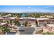 Charming townhomes featuring colorful stucco exteriors, private garages, and beautifully landscaped grounds at 5603 Deer Creek Falls Ct, Las Vegas, NV 89118