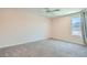 Bright bedroom with carpet and large window allowing natural light at 5660 Oasis Ridge St, North Las Vegas, NV 89031