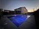 Backyard view with pool, spa, and covered patio perfect for outdoor living and entertaining at 5660 Oasis Ridge St, North Las Vegas, NV 89031