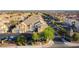 An aerial view of a community of townhomes with red tile roofs and desert landscaping at 5855 Valley Dr # 2145, North Las Vegas, NV 89031