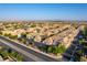 Aerial view of the townhome community, highlighting its well-maintained landscaping and convenient street parking at 5855 Valley Dr # 2145, North Las Vegas, NV 89031
