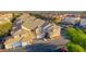 Townhome community featuring red tile roofs, beige stucco exteriors, and mature landscaping at 5855 Valley Dr # 2145, North Las Vegas, NV 89031