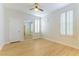 Bedroom features wood floors, bright, natural light, ceiling fan, and ensuite bathroom at 5855 Valley Dr # 2145, North Las Vegas, NV 89031