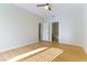 Bright bedroom features wood-look floors and a door to an ensuite bathroom at 5855 Valley Dr # 2145, North Las Vegas, NV 89031