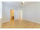 Bright bedroom with wood floors, ceiling fan, and ensuite bathroom at 5855 Valley Dr # 2145, North Las Vegas, NV 89031