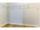 Spacious walk-in closet with wire shelving and light wood-look floors at 5855 Valley Dr # 2145, North Las Vegas, NV 89031
