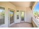 Cozy balcony features views of mature trees and sunny skies, perfect for unwinding at 6160 Rumrill St # 215, Las Vegas, NV 89113