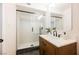 Bathroom featuring a walk-in shower, modern vanity, and updated fixtures at 617 6Th St, Boulder City, NV 89005