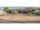 Beautiful single-story home with desert landscaping, mature trees, and a large driveway at 617 6Th St, Boulder City, NV 89005