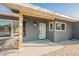 Charming front entrance with modern door, sleek exterior and updated finishes at 617 6Th St, Boulder City, NV 89005