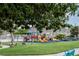 Hemenway Park features playground with mountain views in the distance and a few deer grazing at 617 6Th St, Boulder City, NV 89005