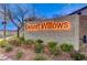 Desert Willows community sign illuminated with warm, inviting lighting at 6264 Canebrake Ct, Las Vegas, NV 89141