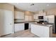 Well-equipped kitchen with stainless steel appliances, ample cabinetry, and a functional island at 6264 Canebrake Ct, Las Vegas, NV 89141