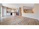 Open-concept living room flowing into the kitchen featuring stylish floors at 6264 Canebrake Ct, Las Vegas, NV 89141