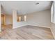 Spacious living area featuring neutral walls, stylish floors, and an open layout at 6264 Canebrake Ct, Las Vegas, NV 89141