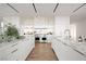 Elegant kitchen featuring marble countertops, stainless steel appliances, and custom cabinetry for a chef-inspired space at 68 Sun Glow Ln, Las Vegas, NV 89135