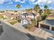 A residential neighborhood with mature trees and well-maintained homes at 6909 Fruit Flower Ave, Las Vegas, NV 89130