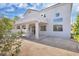 A spacious backyard featuring a covered patio and plenty of room for outdoor activities at 6909 Fruit Flower Ave, Las Vegas, NV 89130