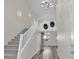 Spacious foyer with staircase, high ceilings, and modern lighting at 6909 Fruit Flower Ave, Las Vegas, NV 89130