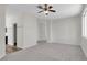 Spacious main bedroom features a ceiling fan and en suite bathroom at 6909 Fruit Flower Ave, Las Vegas, NV 89130