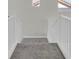 Staircase features carpeted steps and white banister at 6909 Fruit Flower Ave, Las Vegas, NV 89130
