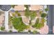 Overhead view of a neighborhood park with walkways and landscaping offering green space close to residential homes at 6916 Gothic Marigold St, Las Vegas, NV 89149