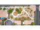 Aerial view of community featuring walking paths, green spaces, and surrounding homes at 6916 Gothic Marigold St, Las Vegas, NV 89149