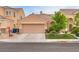 Inviting single-Gathering home features desert landscaping and a spacious two-car garage at 6916 Gothic Marigold St, Las Vegas, NV 89149