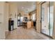 Open kitchen and breakfast nook area with tile floors and access to the backyard patio at 6916 Gothic Marigold St, Las Vegas, NV 89149