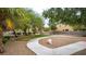 Beautiful community park with mature trees, walking paths, and lush landscaping at 6916 Gothic Marigold St, Las Vegas, NV 89149