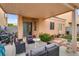 Covered patio with comfortable seating perfect for relaxing or entertaining guests at 6916 Gothic Marigold St, Las Vegas, NV 89149