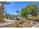 Community park featuring picnic tables, shade structures, mature trees, and well-maintained landscaping for outdoor enjoyment at 7472 Garnet Moon St, North Las Vegas, NV 89084