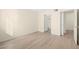 A bedroom is brightly lit with a view of the bathroom at 7885 W Flamingo Rd # 1131, Las Vegas, NV 89147