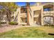 Exterior view of building featuring mature landscaping and community walkways at 7885 W Flamingo Rd # 1131, Las Vegas, NV 89147