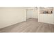 Spacious living room featuring light wood flooring and neutral paint at 7885 W Flamingo Rd # 1131, Las Vegas, NV 89147