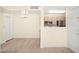 Living space with combined kitchen and dining area and view to front door at 7885 W Flamingo Rd # 1131, Las Vegas, NV 89147