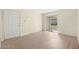Open living space with sliding glass doors leading to a balcony with community views at 7885 W Flamingo Rd # 1131, Las Vegas, NV 89147