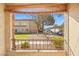 Balcony view of manicured lawn, trees, and parking at 7885 W Flamingo Rd # 1131, Las Vegas, NV 89147